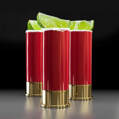 three 12 gauge shot glasses with lemon slices
